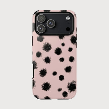 Phone case with black abstract pattern on a pink background