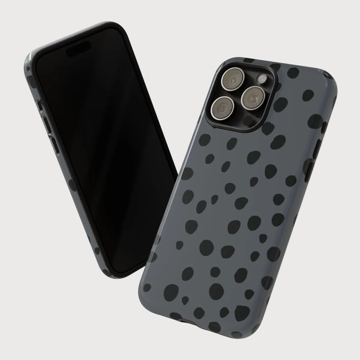 Phone case with black dot pattern on gray background