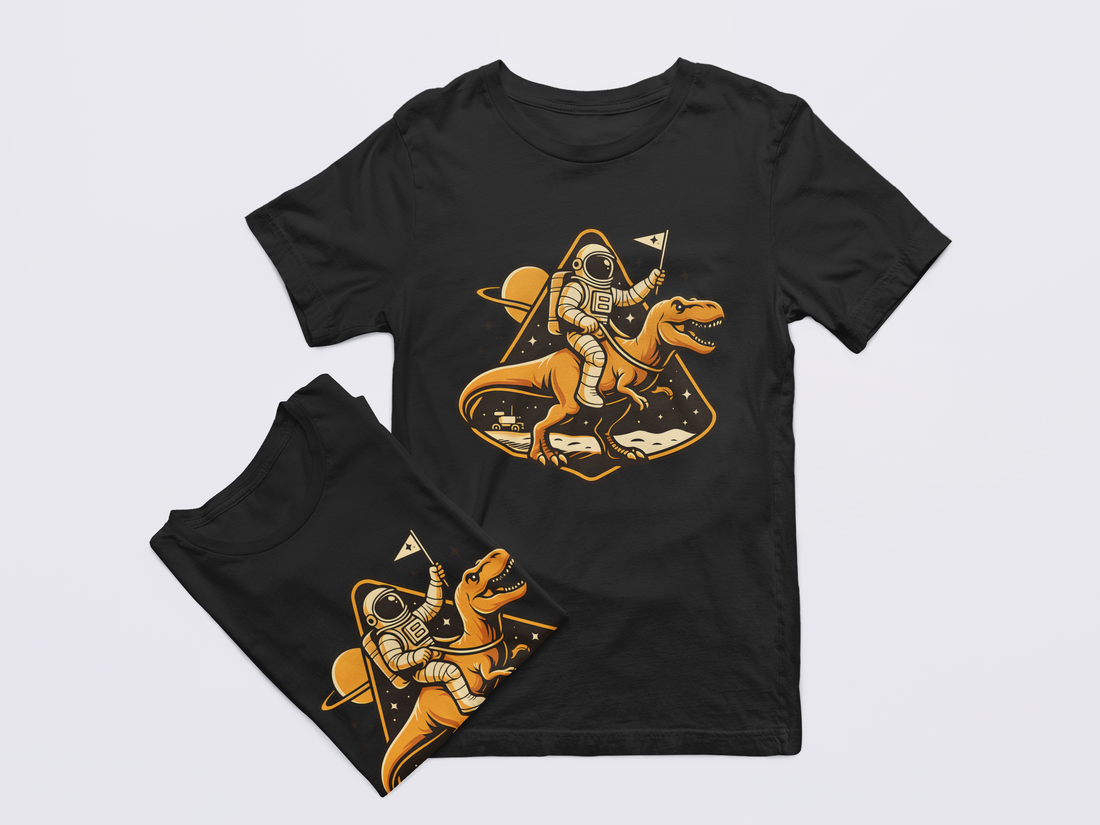 Black t-shirt with a graphic of an astronaut riding a dinosaur on a light gray background