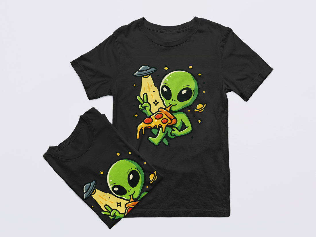 Black t-shirt with alien design on a light gray background