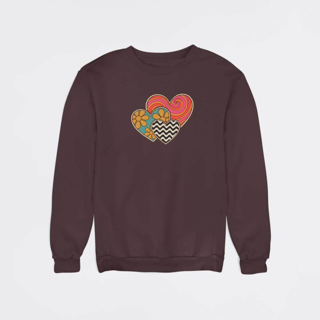 Black sweatshirt with colorful heart design on a white background
