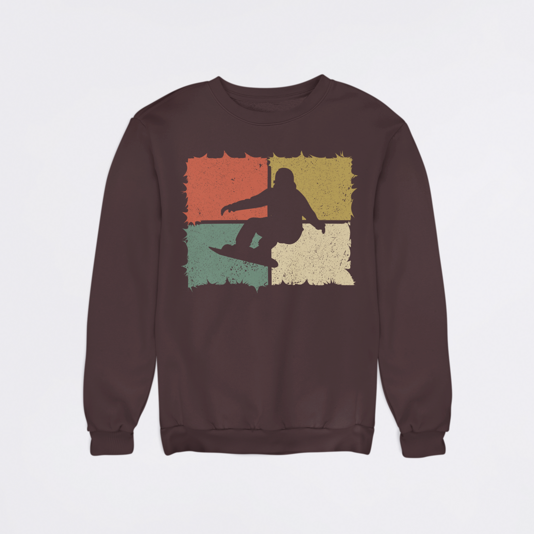 Brown sweatshirt with a graphic of a person on a skateboard in a colorful square design on a light purple background.