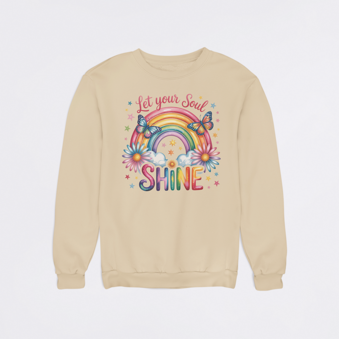 Beige sweatshirt with colorful graphic and 'Let your Soul Shine' text on a light gray background