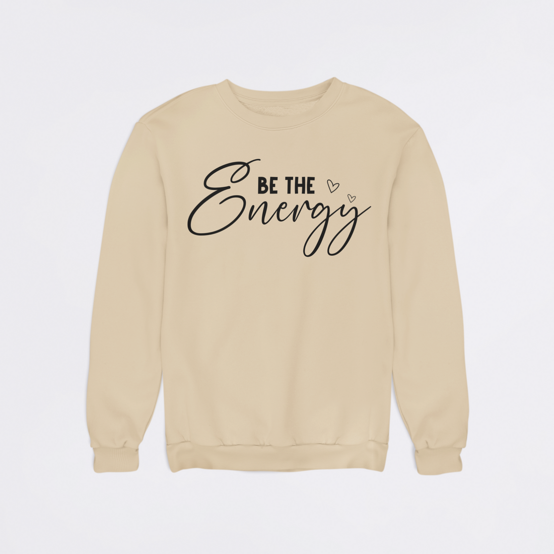 Beige sweatshirt with 'Be the Energy' text on a light gray background