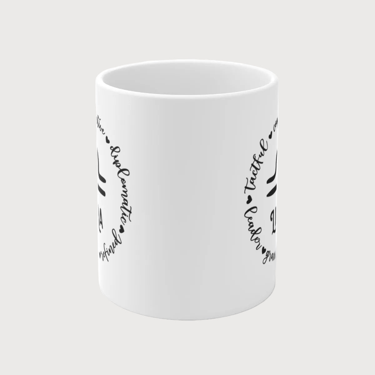 White mug with black text on a white background
