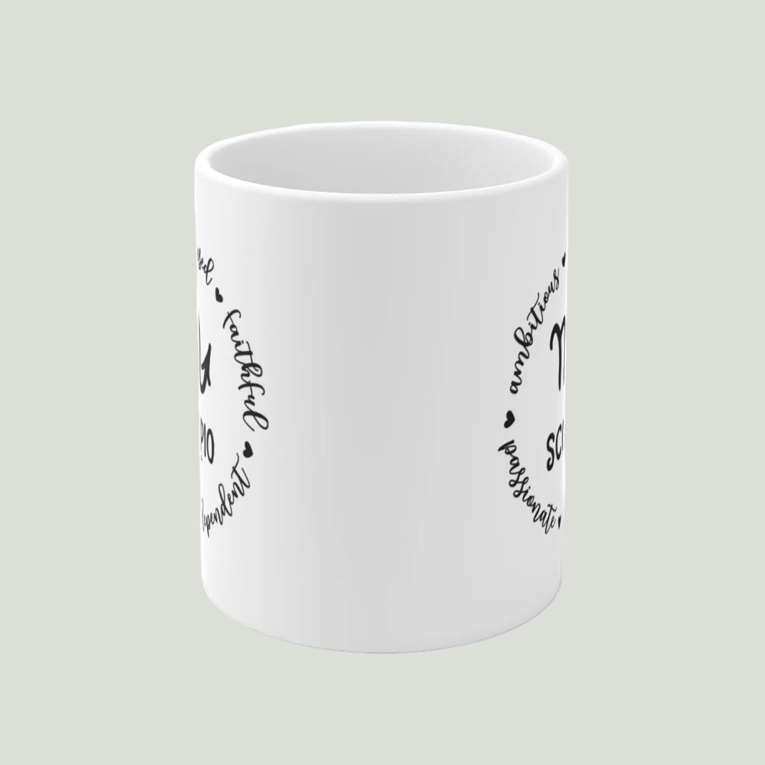 White mug with Scorpio zodiac design and text on a light gray background