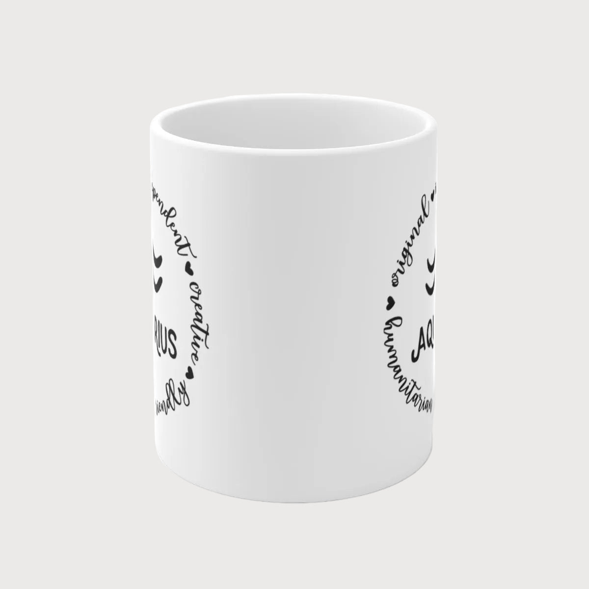 White mug with black text on a white background