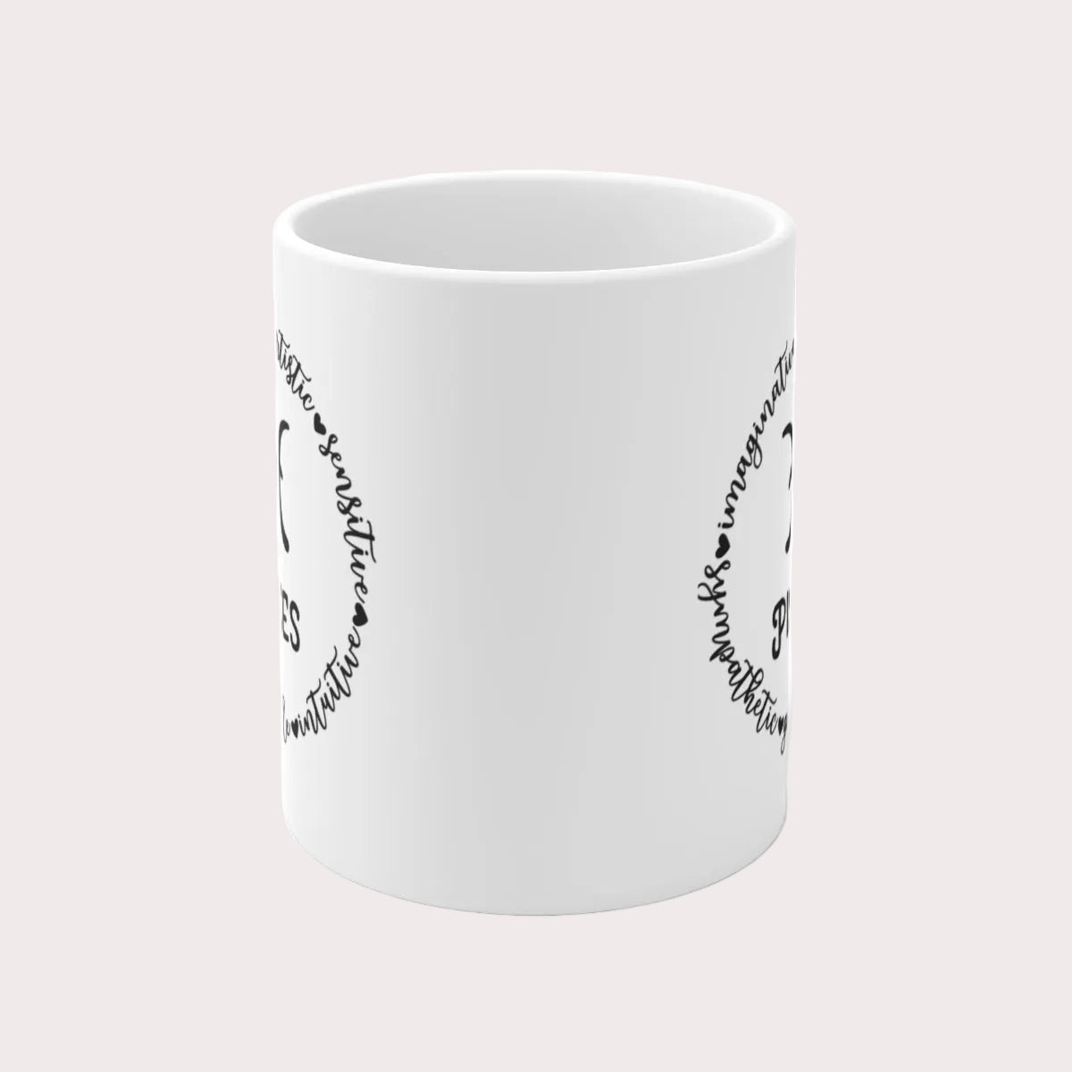 White mug with black text on a light gray background