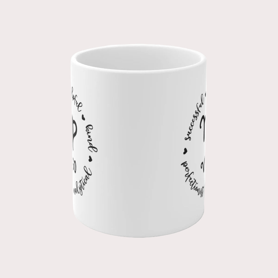 White mug with Virgo zodiac design and text on a white background