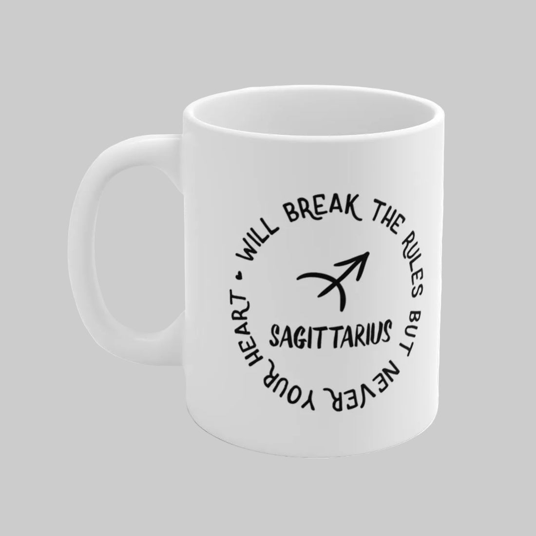 White mug with Sagittarius zodiac design and text on a gray background