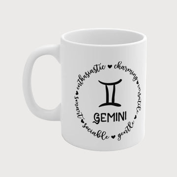 White mug with black Gemini zodiac design on a white background