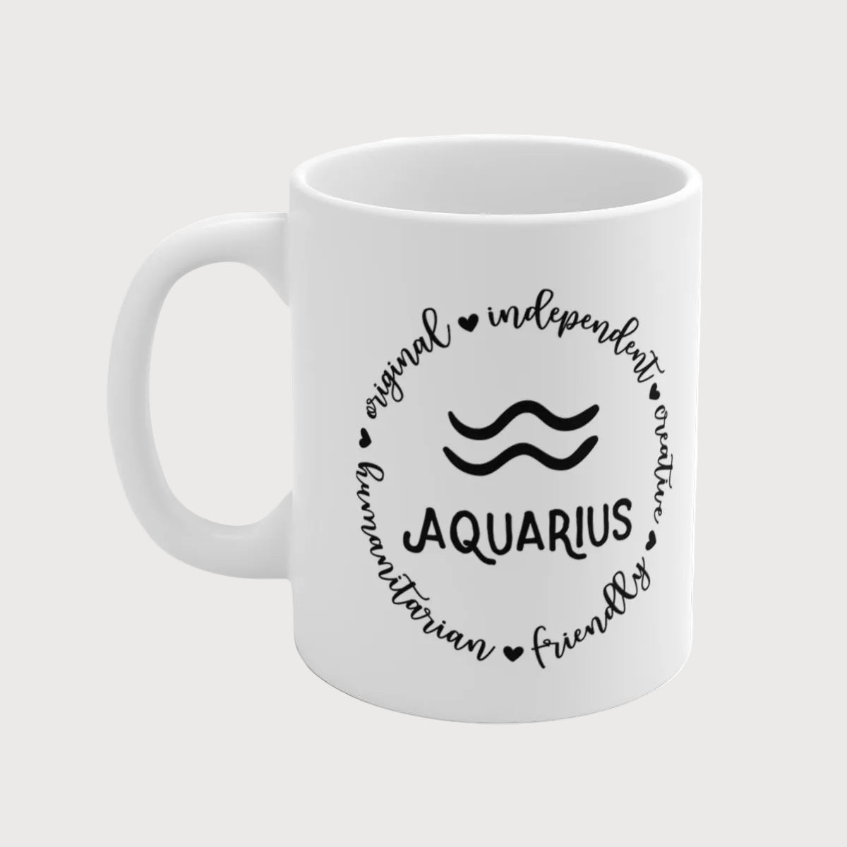 White mug with black Aquarius zodiac design on a white background