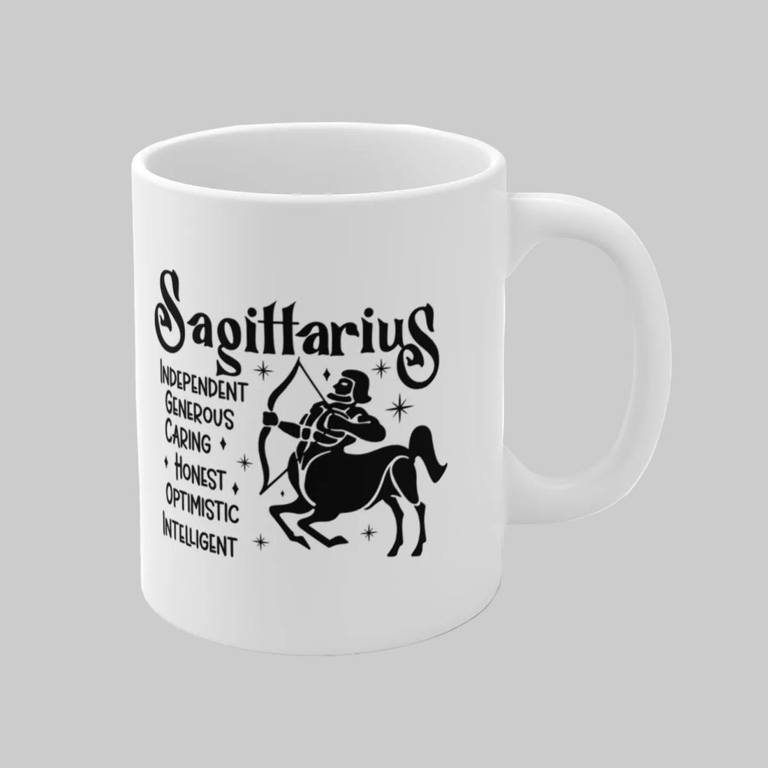 White mug with Sagittarius zodiac design and text on a gray background