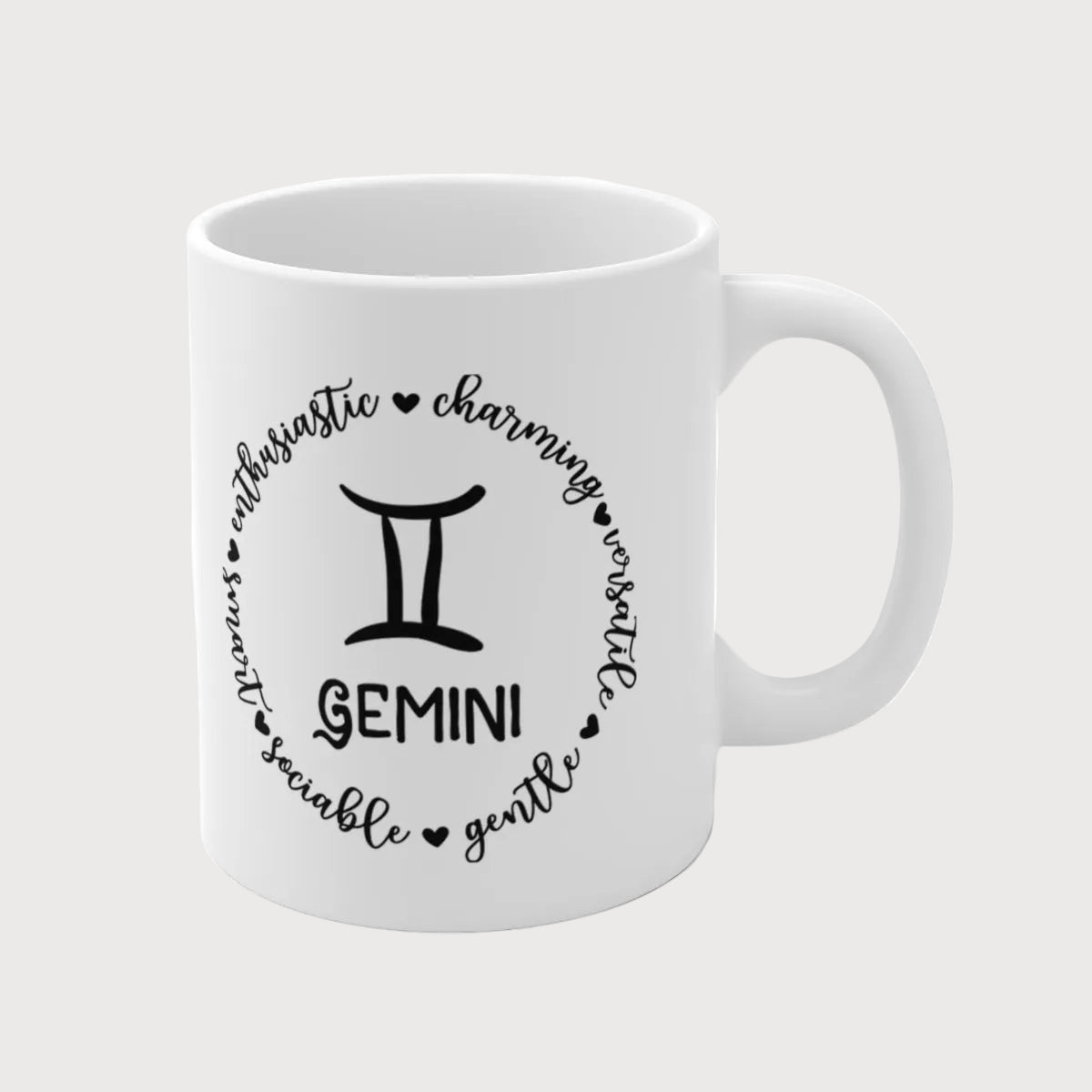 White mug with Gemini zodiac design and text on a white background
