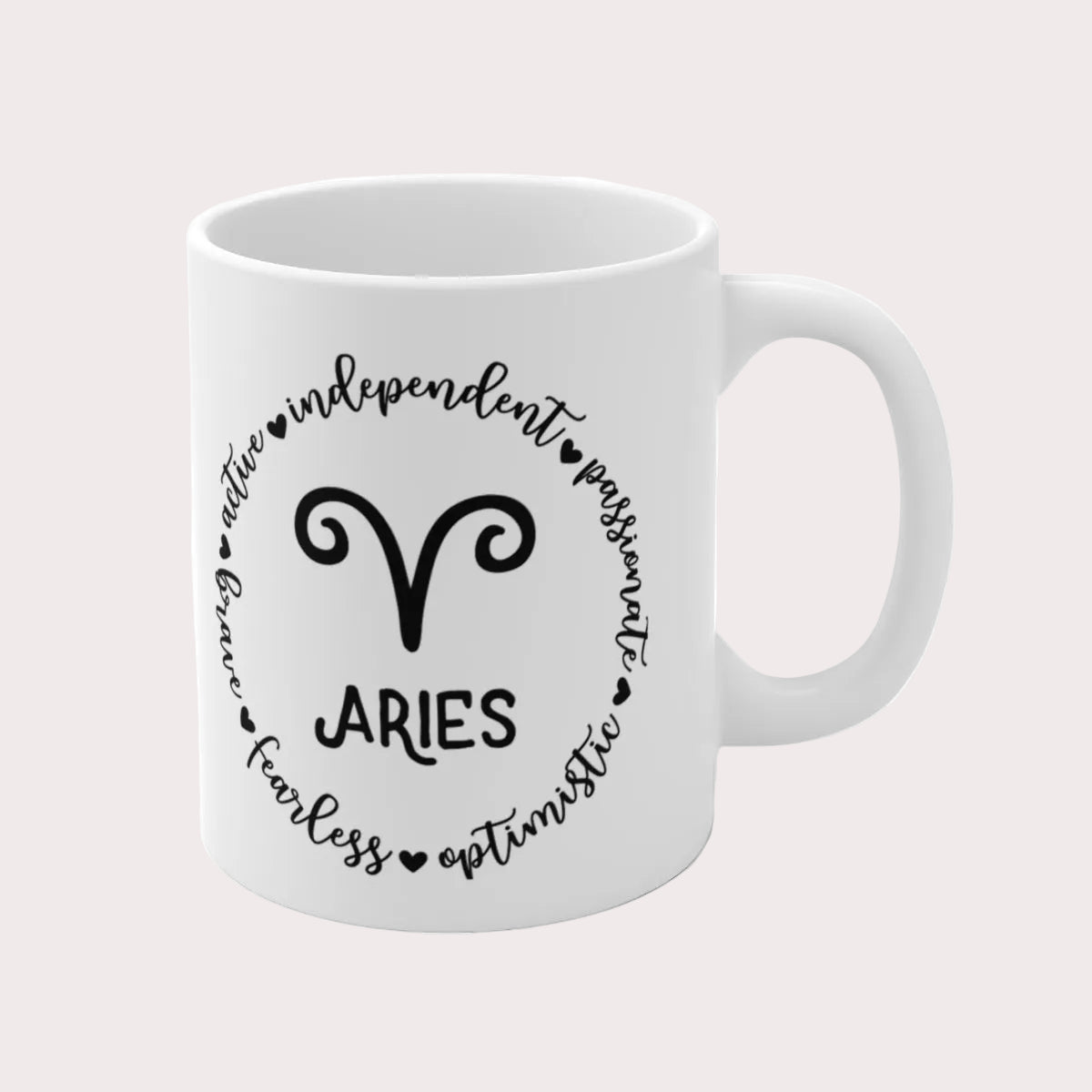 White mug with Aries zodiac design and text on a white background