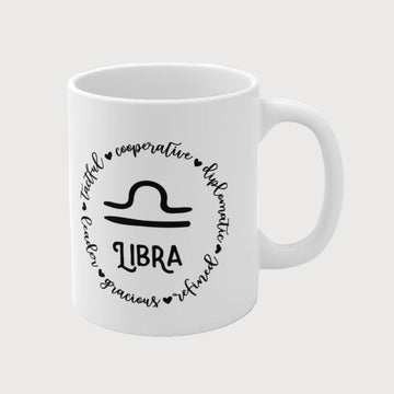 White mug with Libra zodiac design and text on a white background